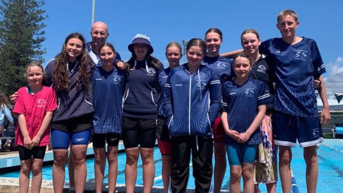 The Tamworth City Swimming Club squad relished the chance to compete again despite dreary conditions in Port Macquarie. Picture Tamworth City Swimming Club Facebook.