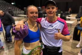 Enja Ryan with her husband and fellow pro boxer, Wade, shortly after her gritty win over Sharma on Saturday. Picture by Zac Lowe.