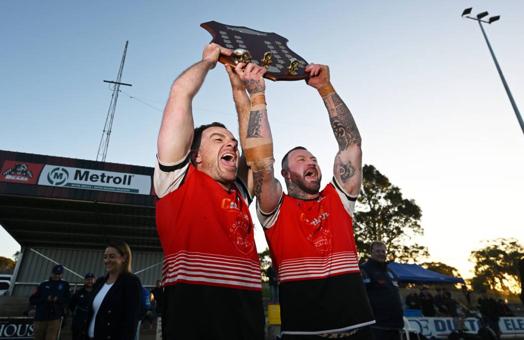 Bears co-captains Scott Blanch and Josh Schmiedel celebrate their grand final victory at Jack Woolaston Oval. Picture by Gareth Gardner. 