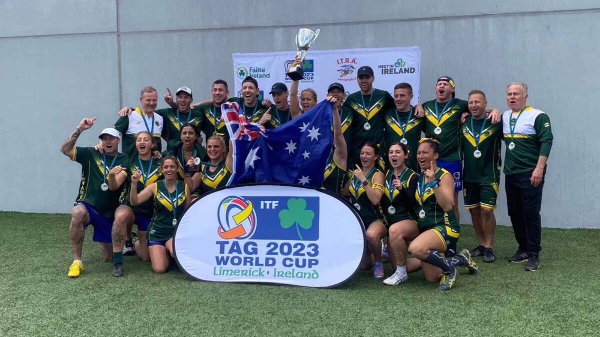 Jones (front row, third from left) celebrates Australia's World Cup win with the rest of her squad. Picture supplied. 