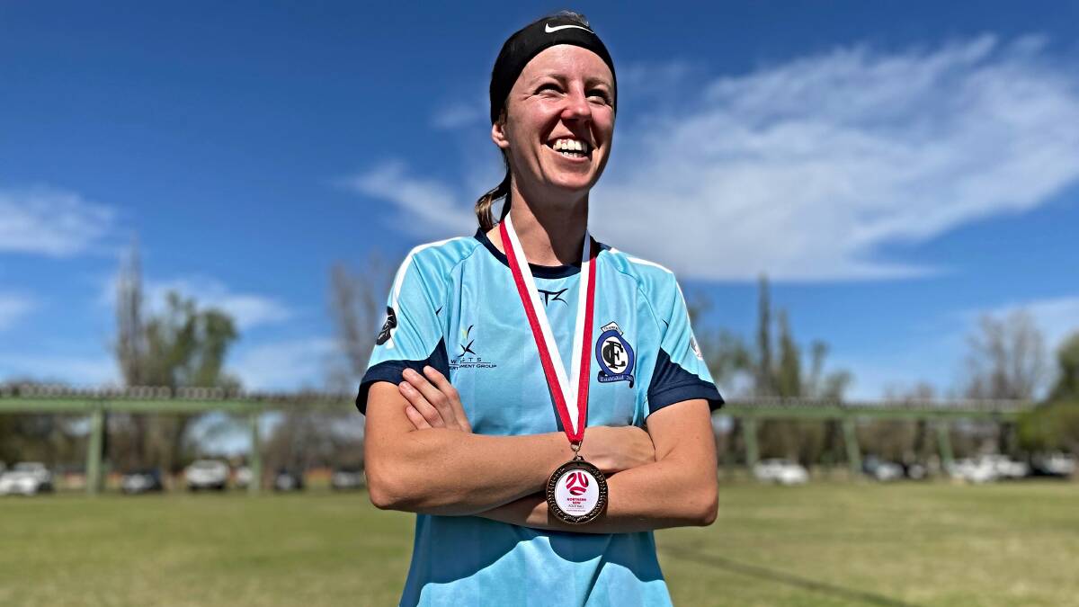 Chloe Nott dons her minor premiership medal after Tamworth FC beat OVA on Saturday. Picture by Zac Lowe.