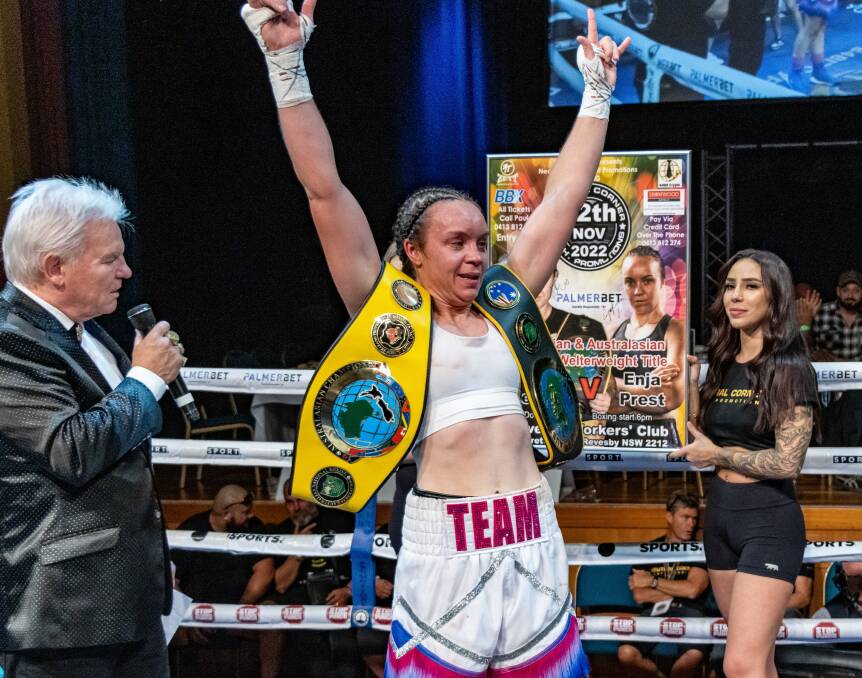 Enja Ryan celebrates shortly after defeating Jamie Edenden in a rematch for two Australian welterweight titles. Picture by Bridget Bartlett Photography.