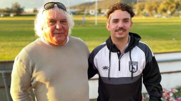 Dylan Porter with his father, Werris Creek legend, Richie, who presented him with the special-made Old Boys jersey on Saturday. Picture by Zac Lowe.