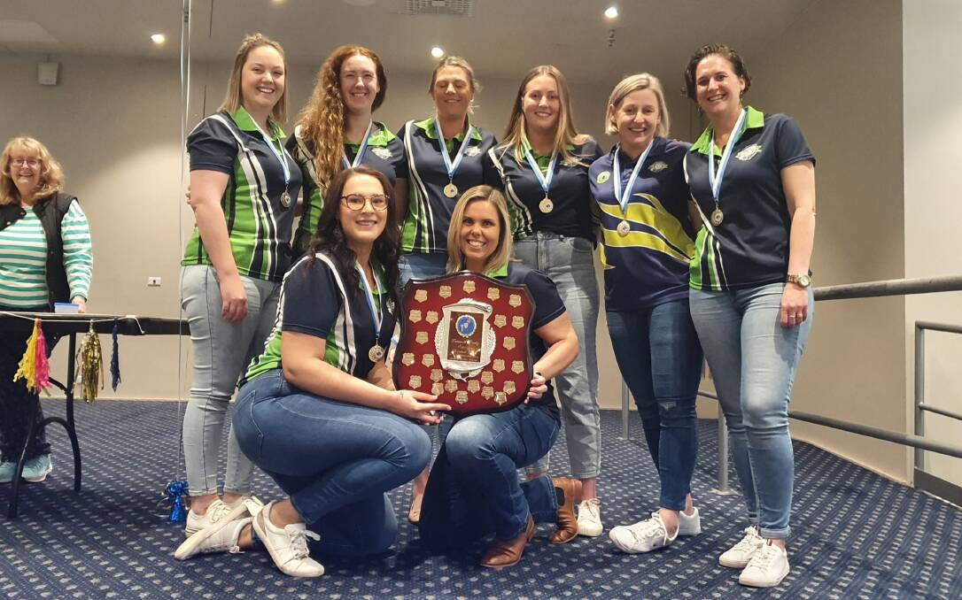 The South Bowlo Kangas players celebrate their hard-earned grand final victory over the Swans Red on Saturday night. Picture Tamworth Netball Association Facebook.