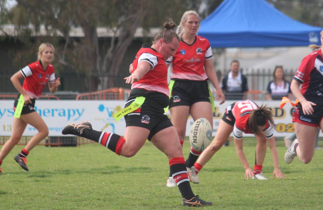 Amy Barraclough prepares to wallop the ball during North Tamworth's unsuccessful major semi-final against the Roosters last weekend. Picture by Zac Lowe.