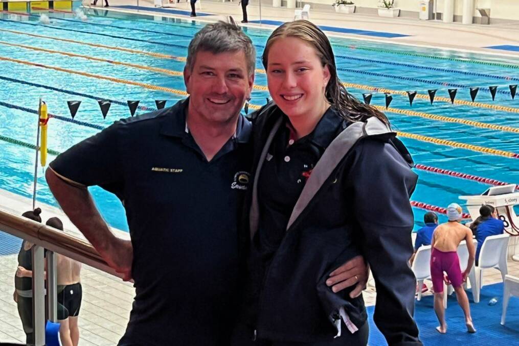 Simon Andren with his daughter, Meghan, at the Sydney Olympic Park Aquatic Centre (SOPAC). Picture supplied.