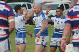 The Boars celebrate a Chris Vidler try in the second half. 