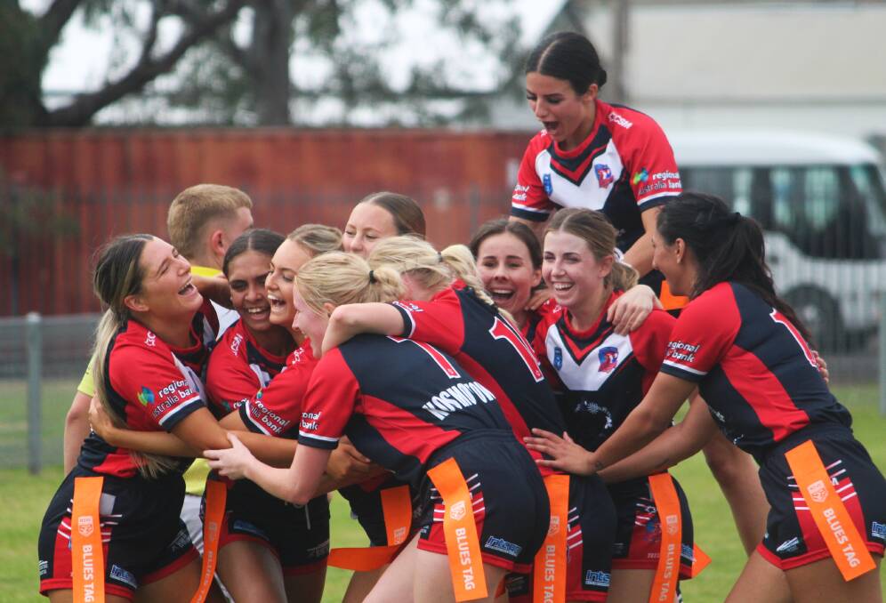 The Roosters women celebrate the try which all but guaranteed their semi-final victory over North Tamworth. Picture by Zac Lowe.