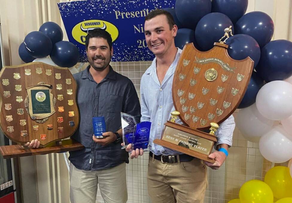 Jack Cameron (right) celebrates his awards at Dungowan's presentation night with his brother-in-law and fellow Cowboys award-winner, Nic Pezzuto. Picture supplied. 