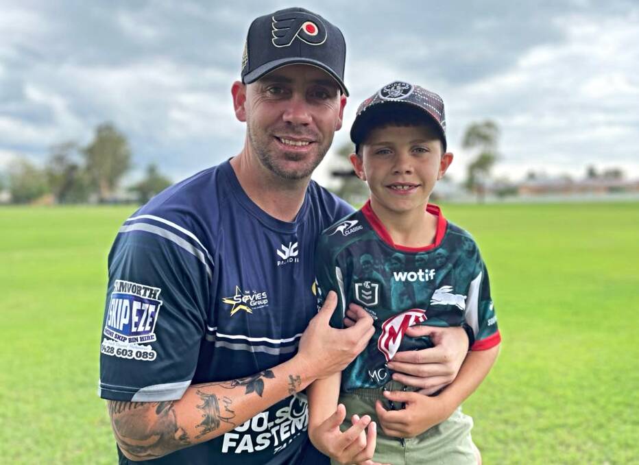 Sam Taylor with his son, Leo, who has inspired the new Cowboys signing to ensure that his next few years rank among his best. Picture by Zac Lowe.