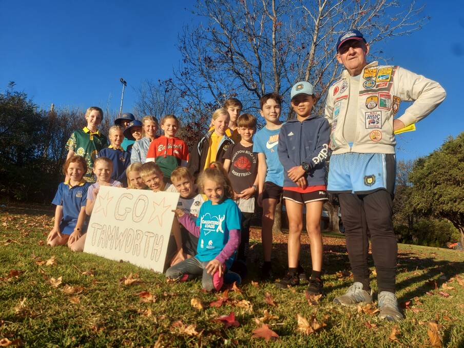Zone assistant coach Mike Cashman, alongside several members of the Tamworth Primary Zone Cross-Country team prior to one of their recent training sessions at ANZAC Park. Picture supplied.
