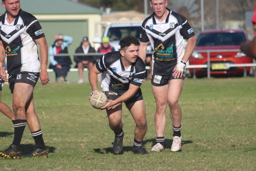 Porter passes the ball out of dummy half during Werris Creek's thumping win over Kootingal-Moonbi on Saturday. Picture by Zac Lowe.