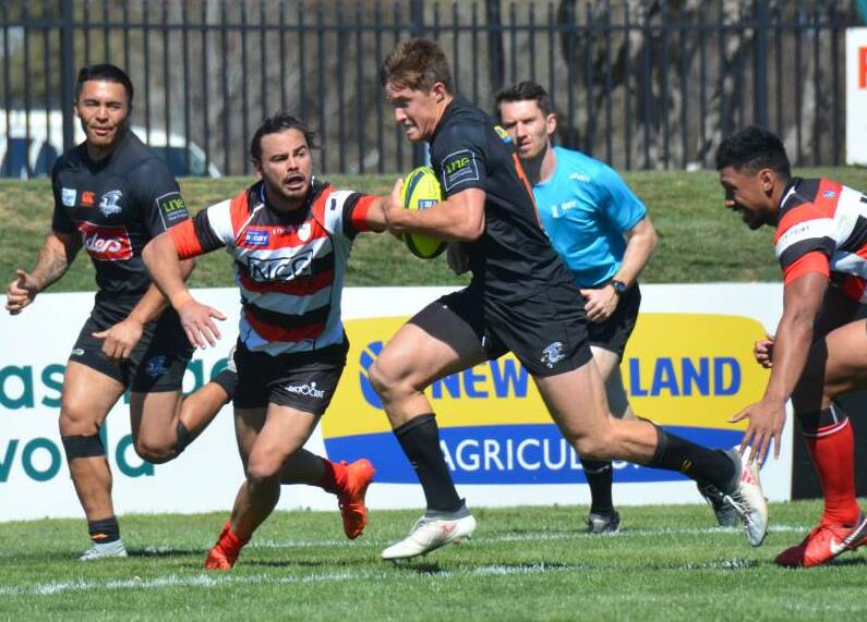 Changing role: Glen Innes' Alex Newsome, here on his way to the tryline against the Canberra Vikings on Sunday, will shift to the centres for the NSW Country Eagles'  clash with Fiji on Saturday.