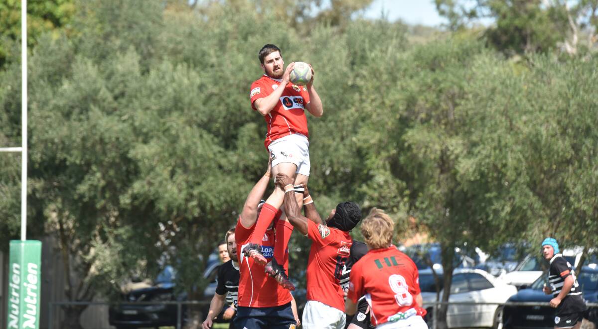 Ray Spradbrow secures this lineout for the Red Devils.