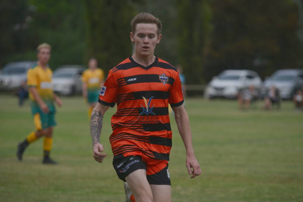 Speed to burn: Eli Rankmore was a constant threat up front and one of Moore Creek's goalscorers in Saturday's Australia Cup win. 