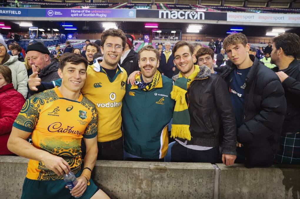Campbell celebrates with some fans after the Wallabies' win over Scotland. Picture Wallabies