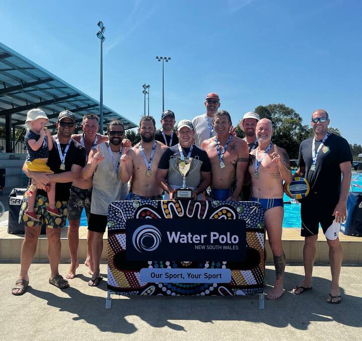 The Tamworth men celebrate their State Masters win. Picture Water Polo NSW
