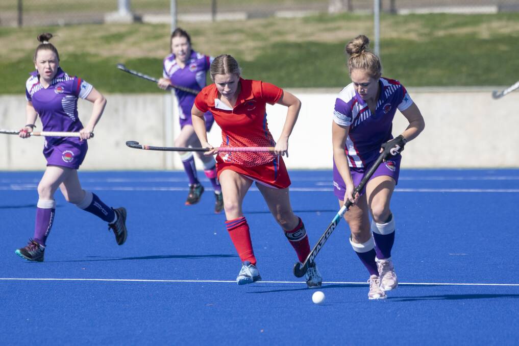 Attack: Katrina Rekunow surges forward for Waratahs during their clash against South United, which they won 5-3. Photo: Peter Hardin