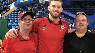 John Ireland (right), here pictured with Nick Kay (centre) and Kay's grandfather Phil Maher, will be courtside in Lille when the Boomers open their Olympic campaign on Saturday night. 