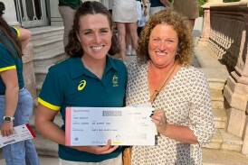 Laura Gourley with her proud mum Georgina and prized ticket to Paris after being announced in the rowing team. Picture Supplied.