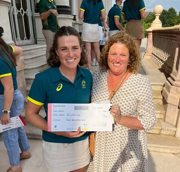 Laura Gourley with her proud mum Georgina and prized ticket to Paris after being announced in the rowing team. Picture Supplied.