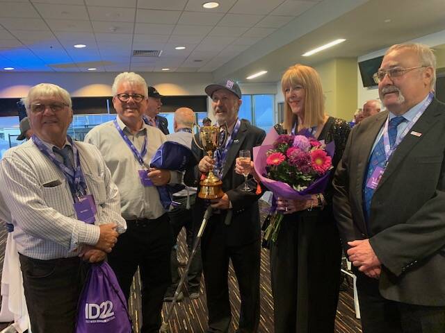 David Pike, Terry Browne, Mark Lowe, Margot Sweaney, and Robert Petersen celebrate with the Inter Dominion Trotters Championship trophy after Just Believe's win in the $250,000 feature on Saturday night. Picture Supplied