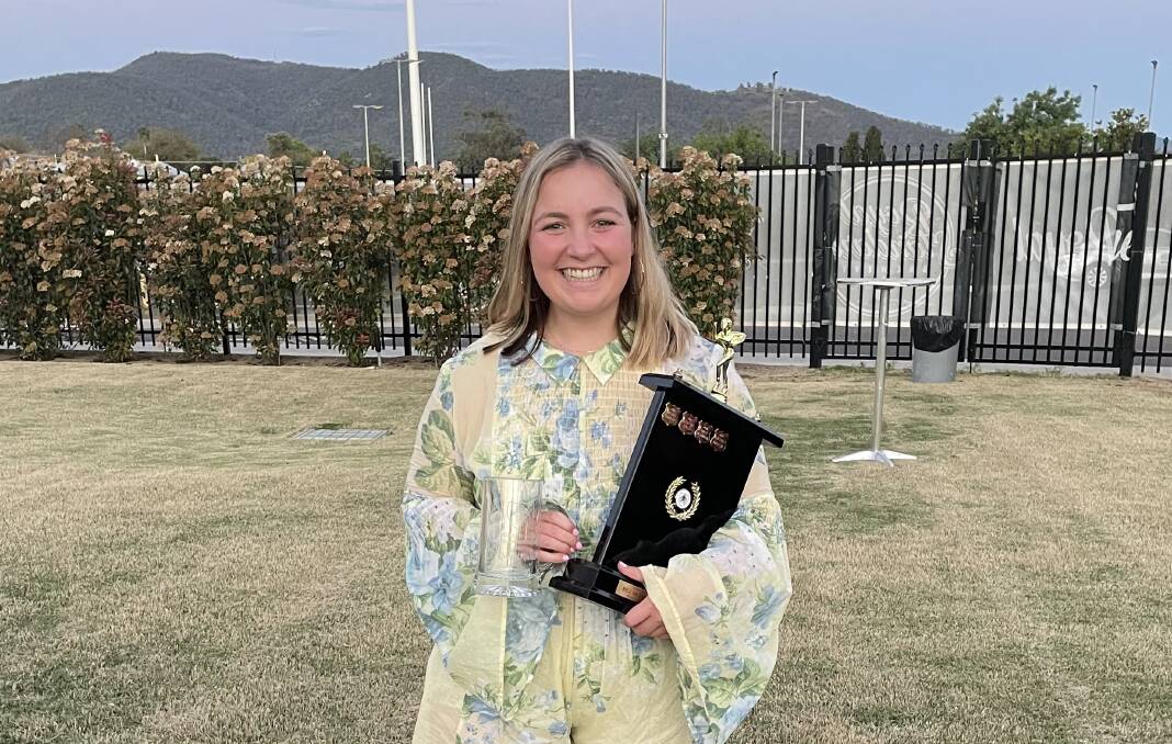 Deep rooted: Tamworth captain Rachel Martin, pictured here with the Bill Mullens Memorial Award she won last year, joked that they "live and breathe" rugby in her family. Photo: Supplied