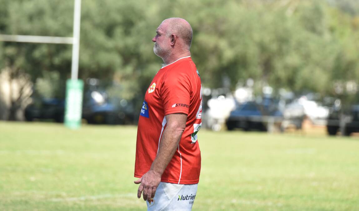 Matt Hannay is a picture of focus as he watches his Red Devils women's side during their recent trial against Tamworth.