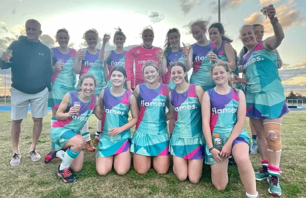 Flames celebrate their grand final triumph over Tudor Wests in Saturday's Tamworth women's first grade grand final. Picture Supplied