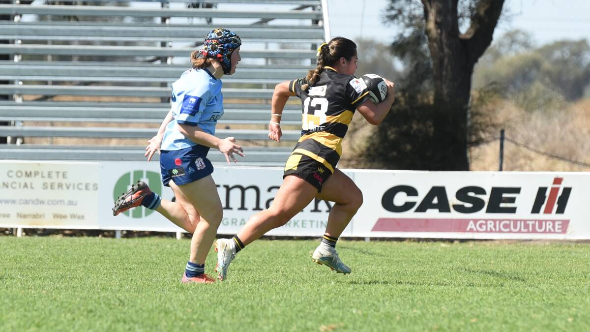 Jayda Simpson races away for the try that sparked Pirates' second half comeback.