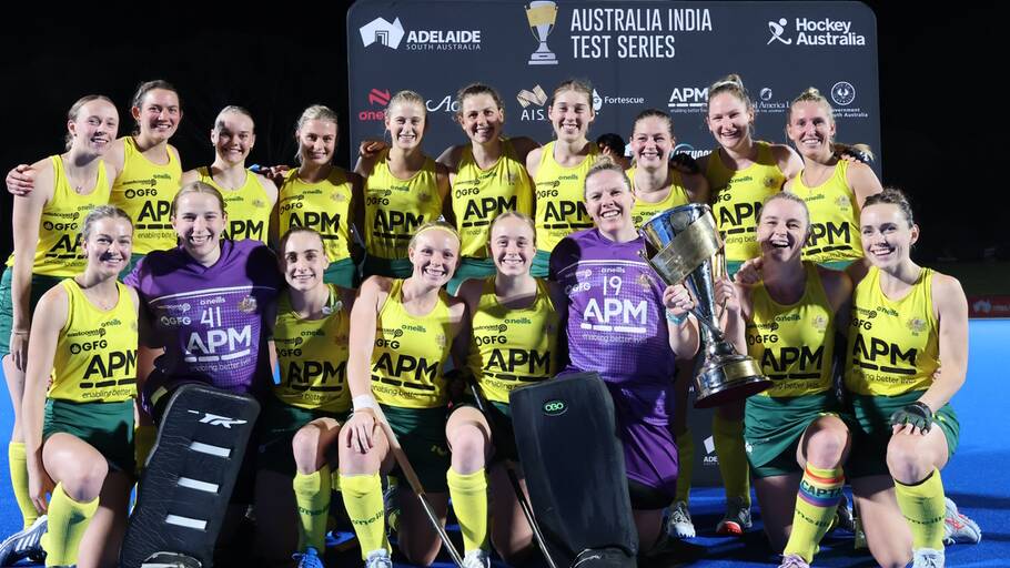 Arnott (back third from right) celebrates with her Hockeyroos team-mates after their series win over India.