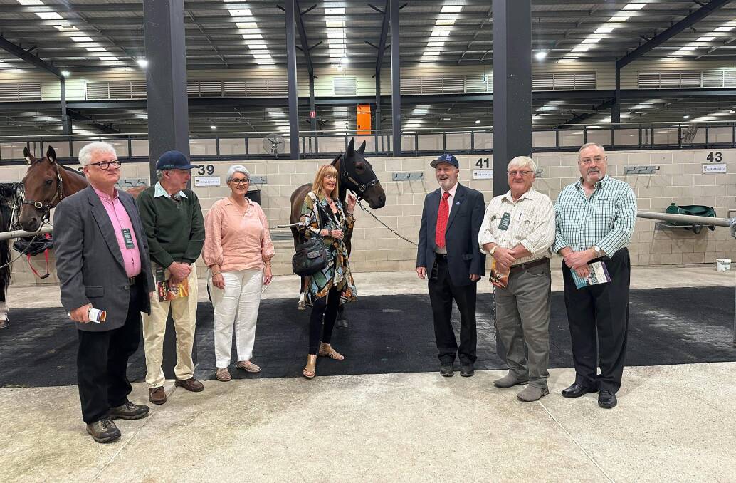 The wonderful ride that it has been for Just Believe's ownership group, which includes (L-R) Tamworth's Terry Browne, Bill Davis (Port Pirie SA), Judy McDonell (Tamworth), Margot Sweaney (Inverell), Mark Lowe, David Pike and Bob Petersen (all Tamworth) has taken them all the way to other side of the world.