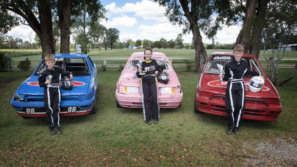 Revving up: Young speedway drivers (L-R) Benji Gordon, Isobelle Jennar-Urquhart and Jackson Gordon had some great results in the junior sedans at Grafton last weekend. Photo: Peter Hardin 050121PHG008