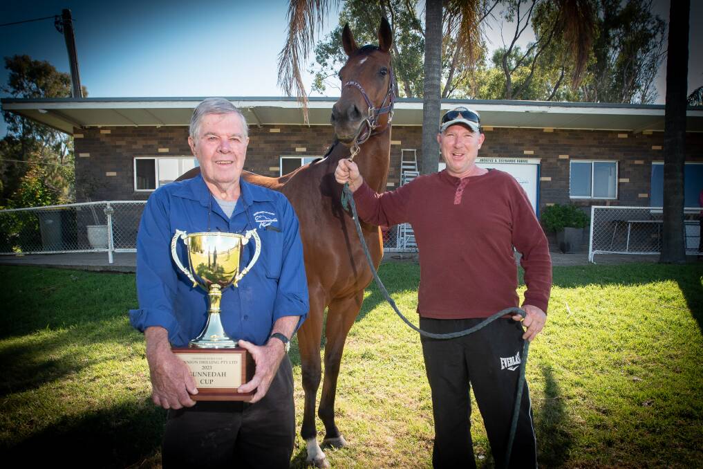 Gunnedah Jockey Club president Kevin Edmonds and local trainer Gavin Groth, pictured with hopeful Gunnedah Cup starter Norman, are eagerly anticipating Sunday's showcase meeting. Picture by Peter Hardin