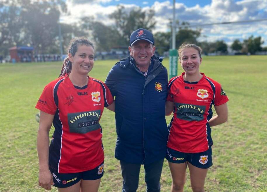 Barr (right) and mum Simone Lickorish (left), pictured with Red Devils coach John Hickey, last year became the first mother and daughter to play for the club. Picture: Breanna Jones