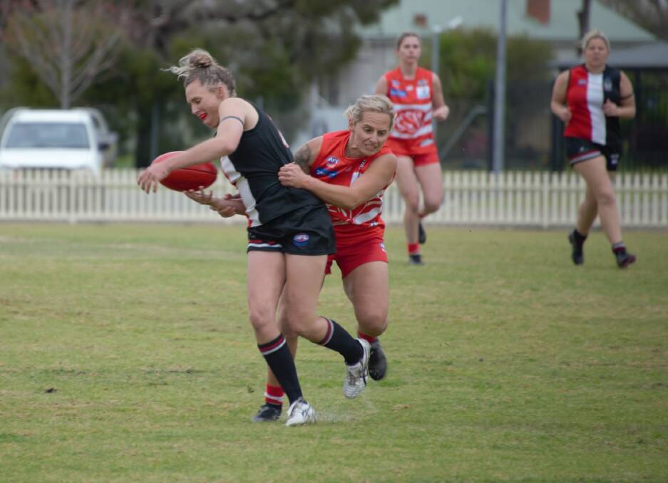 Swans captain Jess O'Brien goes in hard on defence during their preliminary final to the Saints. Picture by Sonia Lewis