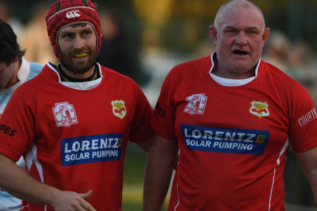 Hannay, here being congratulated by Ron Hobden after scoring his second try against Quirindi, has been a real warrior for the Red Devils. Picture by Samantha Newsam
