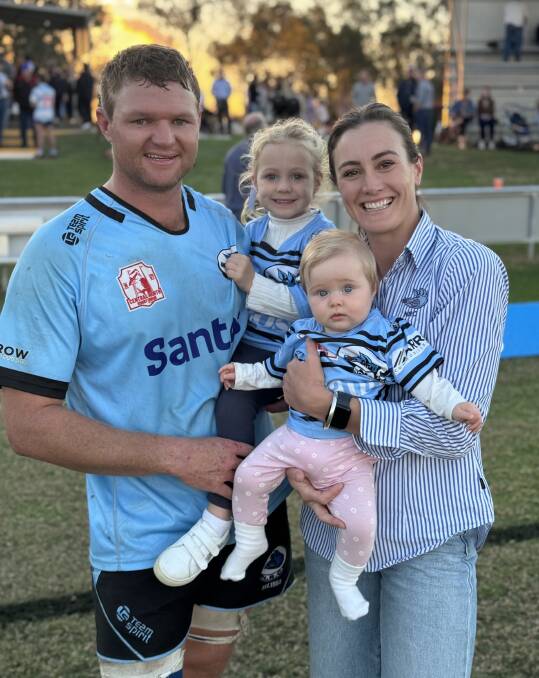 Shaine Maunder, pictured here with husband Jack and their two daughters Matilda, 3, and Lottie, who is nine months, after he played his 150th game for Narrabri, recently, has joined him on the field this season. Picture supplied