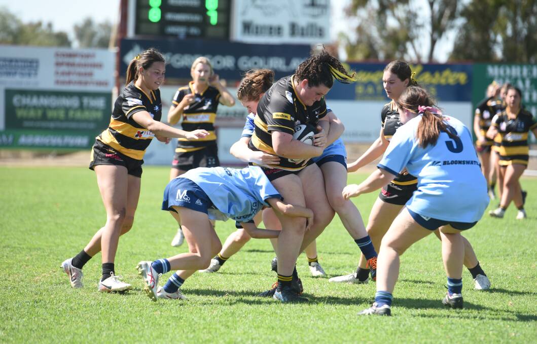Molly Cullen takes the ball up strongly for Pirates during their elimination final win over Scone.