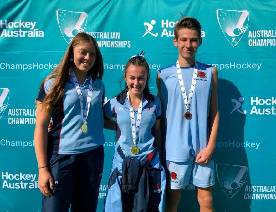 Talented trio: (L-R) Chelsea Thornton, Amber Witney and Nick O'Connor with their national under-15s championships medals. Thornton and Witney's side won gold and O'Connors bronze.