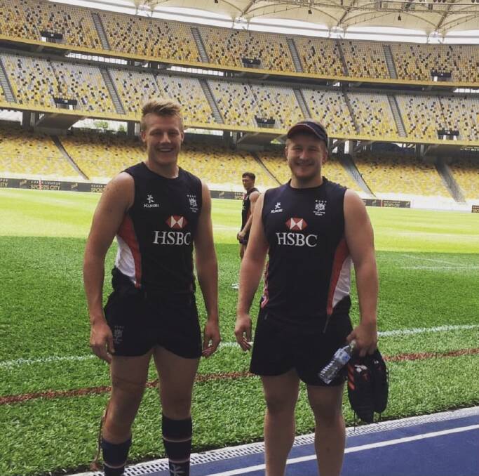 Parfitt with brother Michael before a game for Hong Kong.
