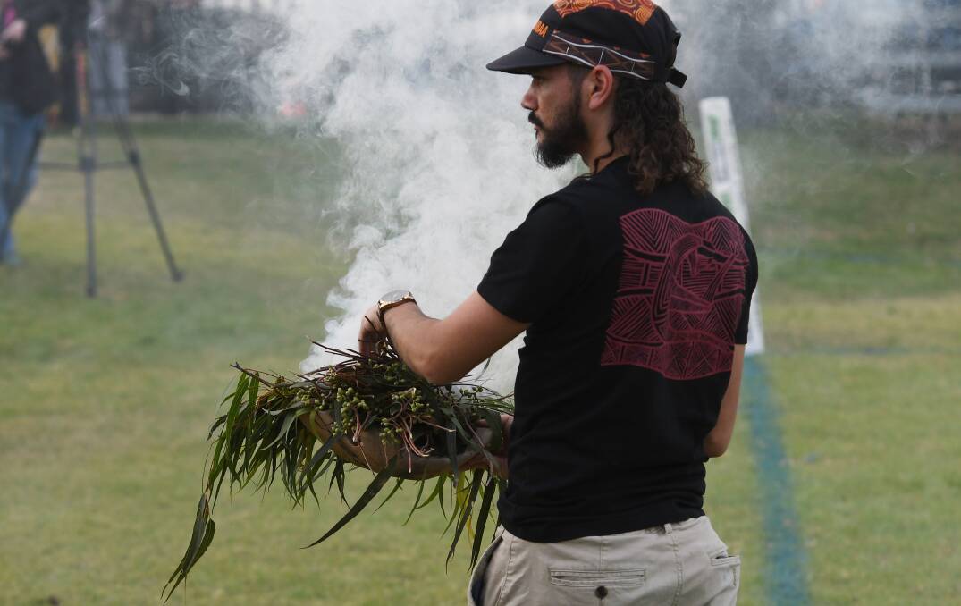 Kaylab Waters conducted the smoking ceremony. Picture by Gareth Gardner