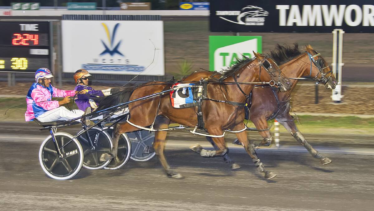 Man From Braavos, with Joe Taaffe handling the reins, just sneaks home on the inside to win the fifth Golden Guitar heat over One For The Rodi (Michael Formosa). Picture PeterMac Photography.