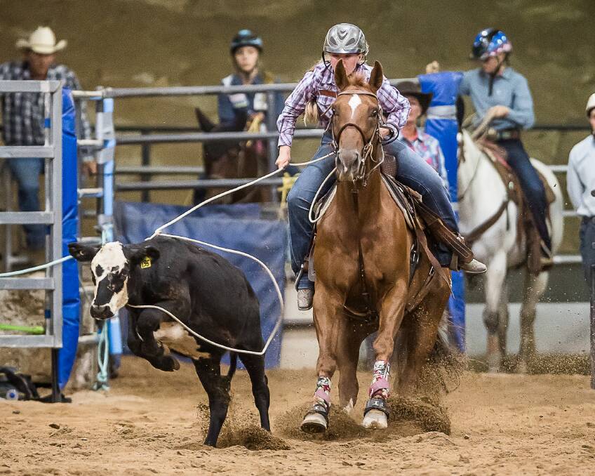 Riley Leys and 'Radar' stop the clock in 2.97 secs to win the first round of the junior breakaway roping. Picture Stephen Mowbray