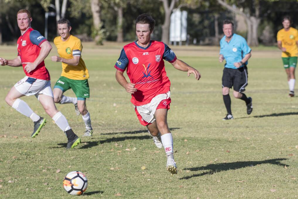Full of running: Will Menz on the attack for Oxley Vale Attunga as they demolished South Tamworth two weeks ago. The Mushies will be hoping to repeat that result against North Armidale on Saturday. Photo: Peter Hardin