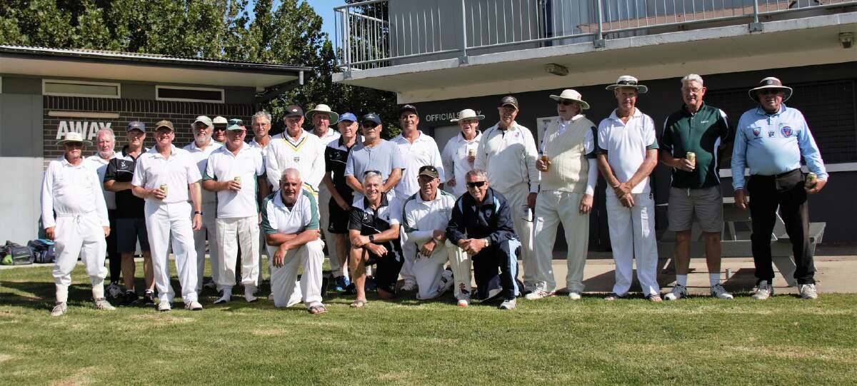 Good times: The Tamworth and New England sides pose after last Sunday's Doug Walters Cup clash, which Tamworth won convincingly to remain unbeaten in this season's competition. Photo: New England Veterans Cricket Facebook