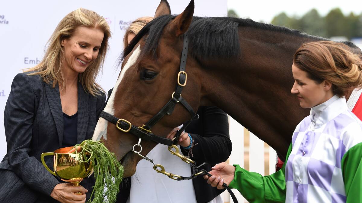 Michelle Payne and 2015 Melbourne Cup winner Prince Of Penzance with Rachel Griffiths, the director and produicer of the movie "Ride Like A Girl". Picture by Lachlan Bence.