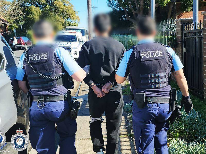 A police operation has led to six arrests and the seizure of dozens of illegal SIM boxes. Photo: HANDOUT/AUSTRALIAN FEDERAL POLICE