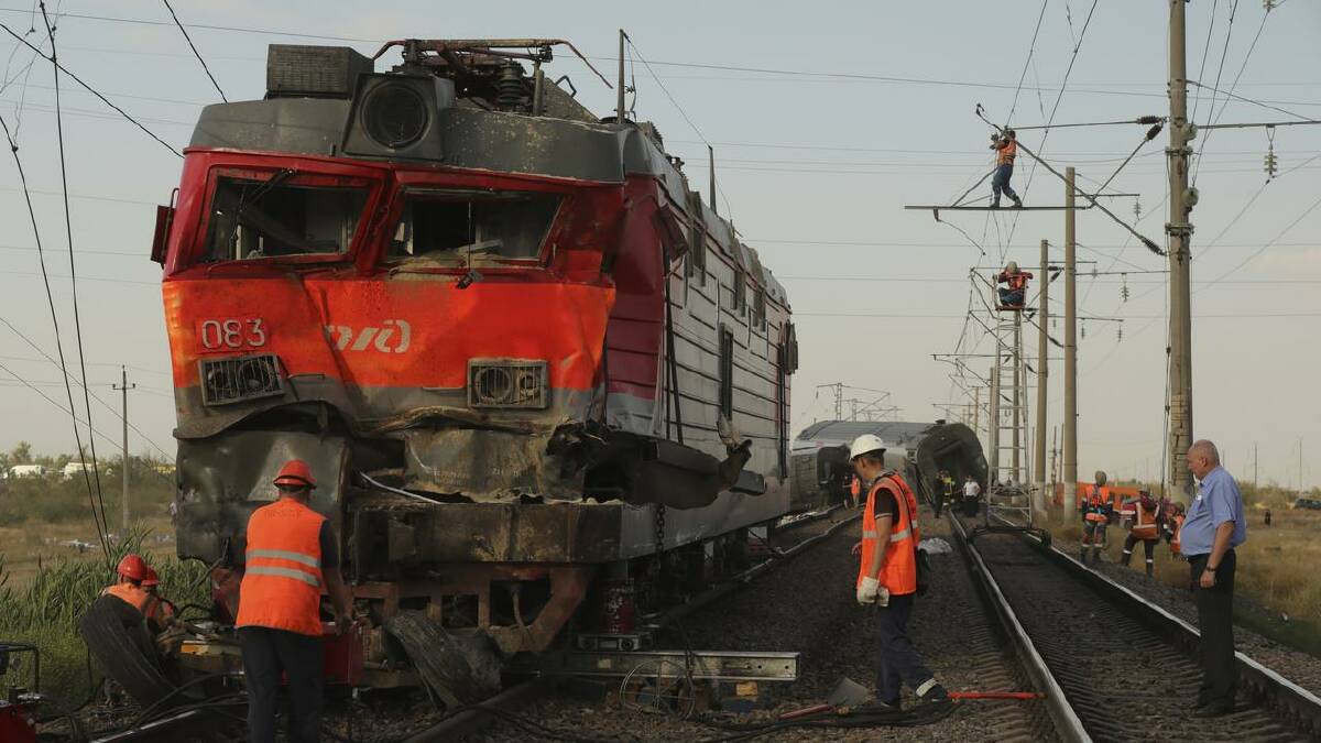 More than 20 people remain in hospital after the collision between a train and truck. (AP PHOTO)