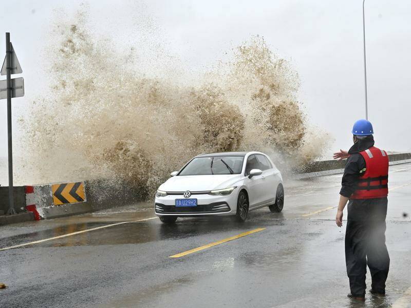 Typhoon Gaemi has been downgraded as a tropical storm after crossing the coast in Fujian province. Photo: AP PHOTO